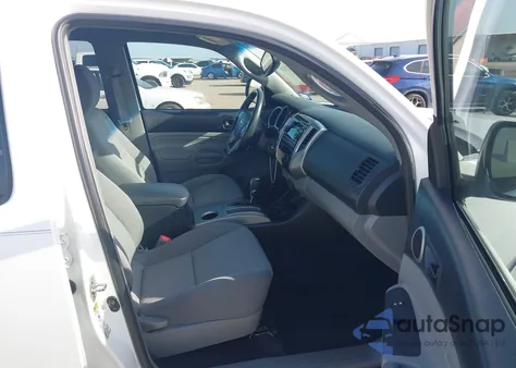 2012 Toyota Tacoma Base V6 z USA, uszkodzony, nr VIN 3TMLU4EN3CM100527